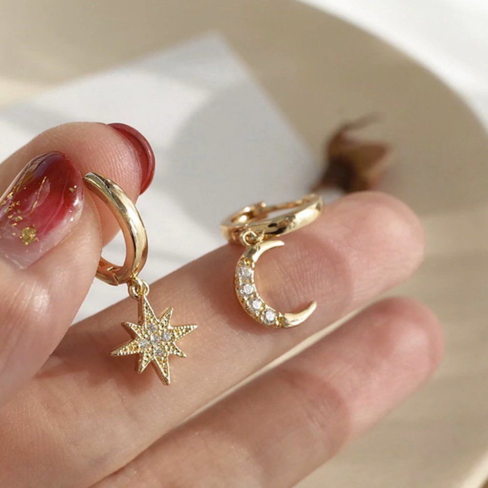 Mismatch Moon and Star Goldtone Huggie Earrings